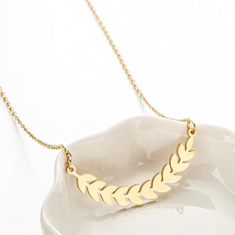 Fashion Ladies' Versatile Plant Pendant Necklace – Leaf & Diamond Cross Design, Jewelry